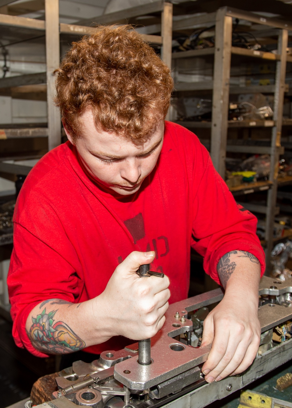 USS Ronald Reagan (CVN 76) Sailors perform aircraft maintenance