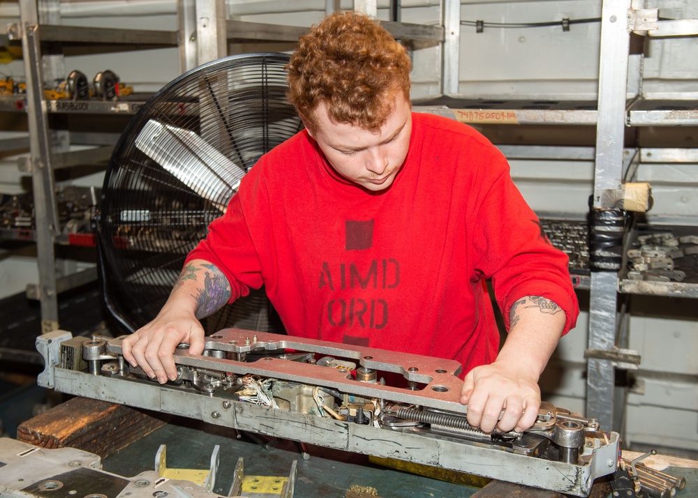 USS Ronald Reagan (CVN 76) Sailors perform aircraft maintenance