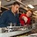 USS Ronald Reagan (CVN 76) Sailors perform aircraft maintenance