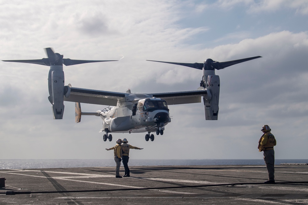 USS Ronald Reagan (CVN 76) conducts flight operations in support of a multi large-deck event with USS Carl Vinson (CVN 70) and Japanese Maritime Self-Defense Force First-in-class helicopter destroyer JS Hyuga (DDH 181)