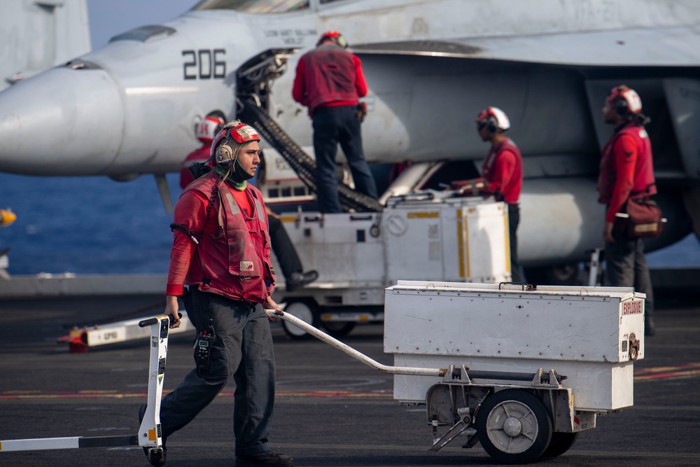 USS Ronald Reagan (CVN 76) conducts flight operations in support of a multi large-deck event with USS Carl Vinson (CVN 70) and Japanese Maritime Self-Defense Force First-in-class helicopter destroyer JS Hyuga (DDH 181)