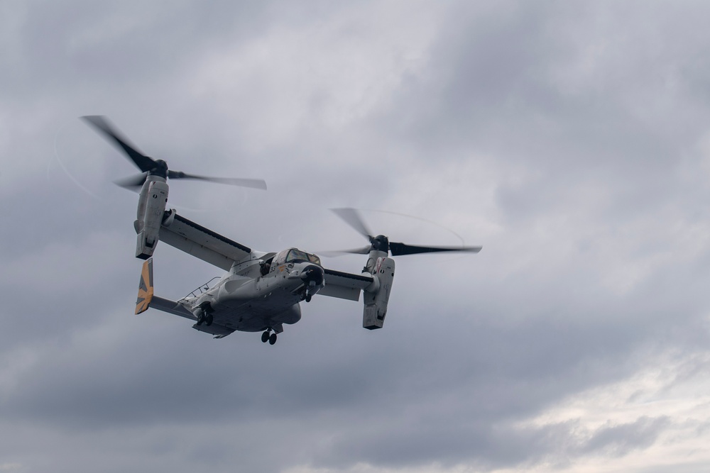 USS Ronald Reagan (CVN 76) conducts flight operations in support of a multi large-deck event with USS Carl Vinson (CVN 70) and Japanese Maritime Self-Defense Force First-in-class helicopter destroyer JS Hyuga (DDH 181)