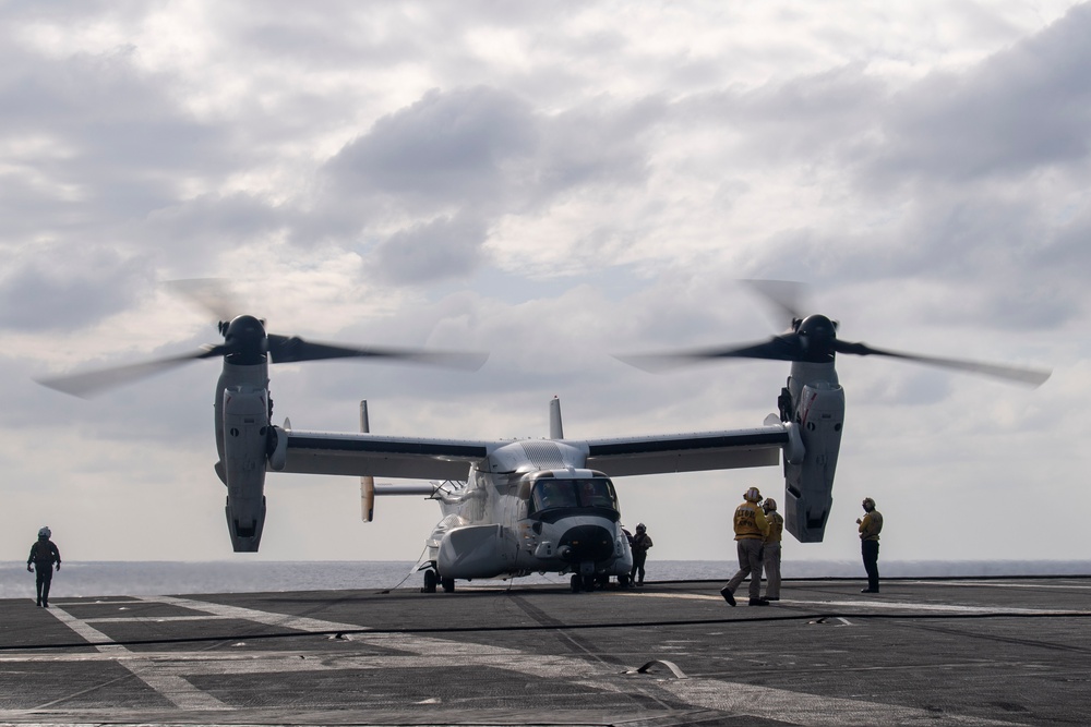USS Ronald Reagan (CVN 76) conducts flight operations in support of a multi large-deck event with USS Carl Vinson (CVN 70) and Japanese Maritime Self-Defense Force First-in-class helicopter destroyer JS Hyuga (DDH 181)