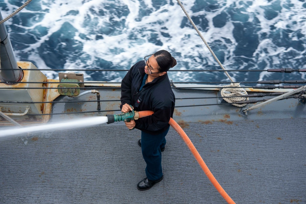 USS Kidd (DDG 100) Sailor Performs Freshwater Wash Down