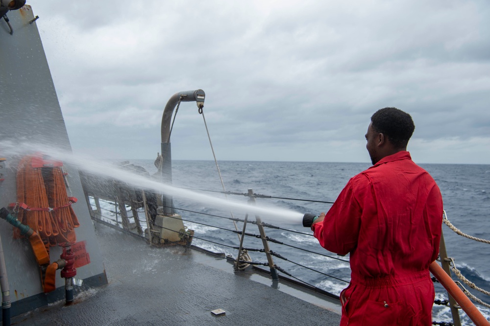 USS Kidd (DDG 100) Sailor Performs Freshwater Wash Down