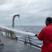 USS Kidd (DDG 100) Sailor Performs Freshwater Wash Down