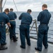 USS Kidd (DDG 100) Sailor Performs Freshwater Wash Down