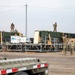 Soldiers and Airmen prepare Patriot Missiles for transportation