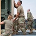 Soldiers and Airmen prepare Patriot Missiles for transportation