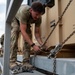 Soldiers and Airmen prepare Patriot Missiles for transportation