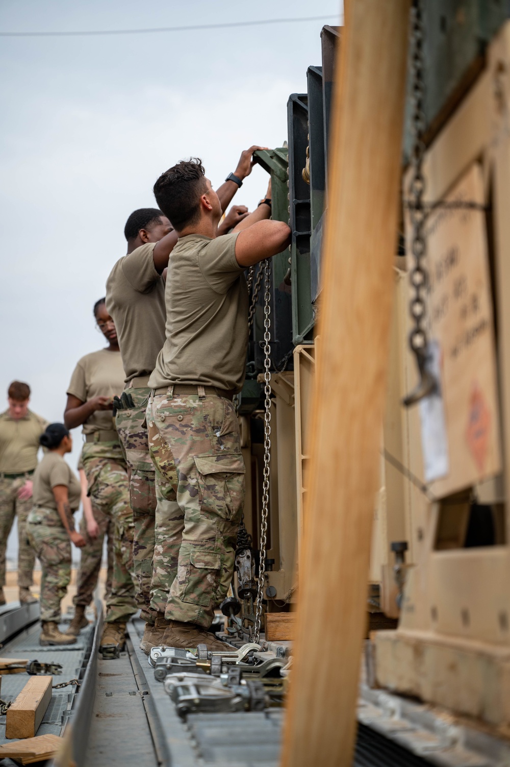 Soldiers and Airmen prepare Patriot Missiles for transportation