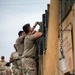 Soldiers and Airmen prepare Patriot Missiles for transportation