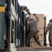 Soldiers and Airmen prepare Patriot Missiles for transportation