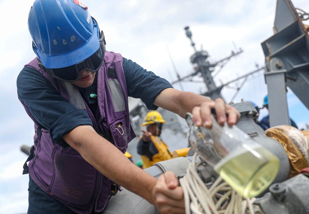 USS Dewey (DDG 105) Conducts Underway Replenishment with USNS Tippecanoe (T-AO 199) While Operating in the South China Sea