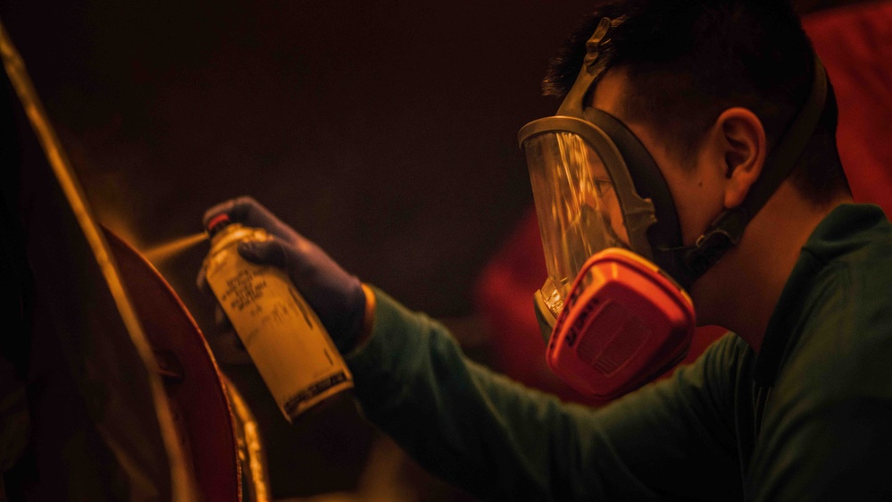 Sailor conducts maintenance aboard USS Carl Vinson