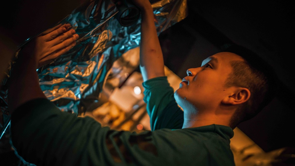 Sailor conducts maintenance aboard USS Carl Vinson