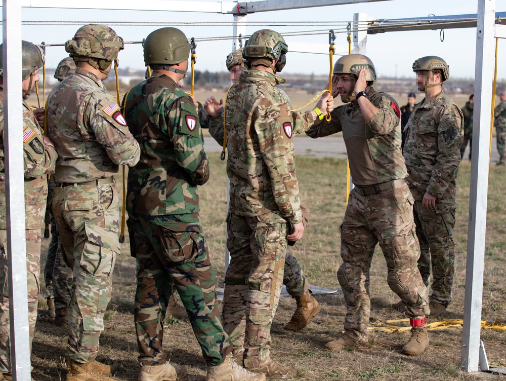 Paratroopers with Special Operations Command Europe jump with partners from Moldova