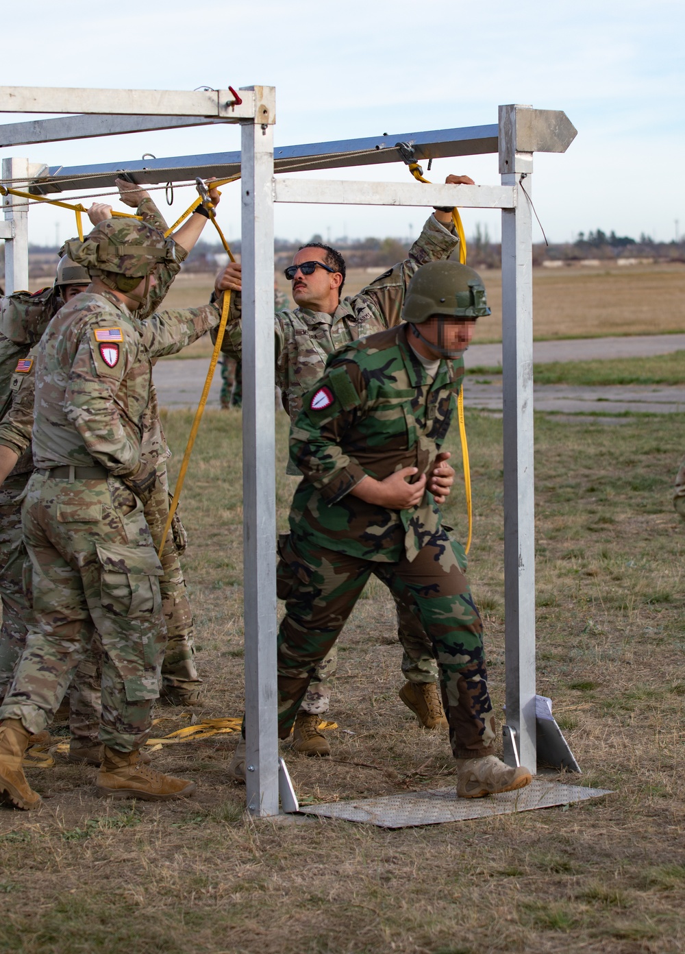 Paratroopers with Special Operations Command Europe jump with partners from Moldova