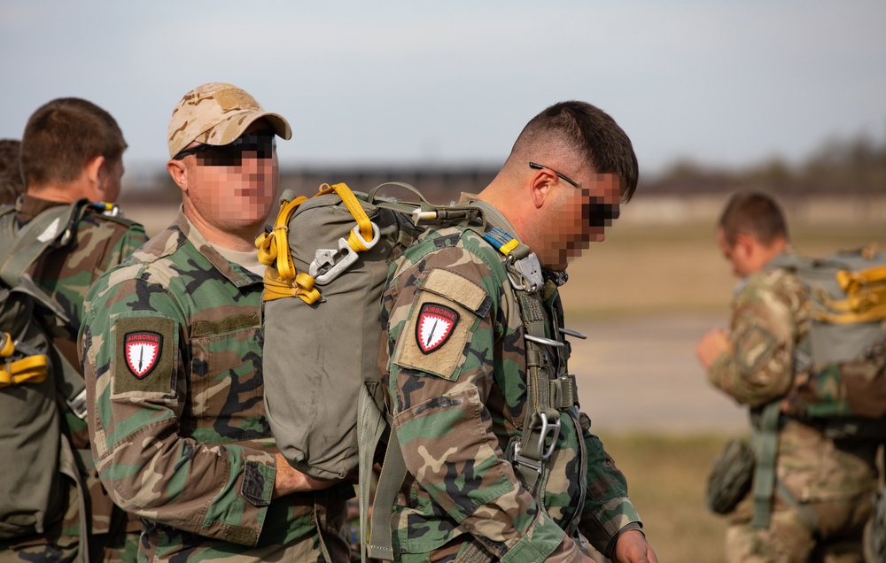 Paratroopers with Special Operations Command Europe jump with partners from Moldova