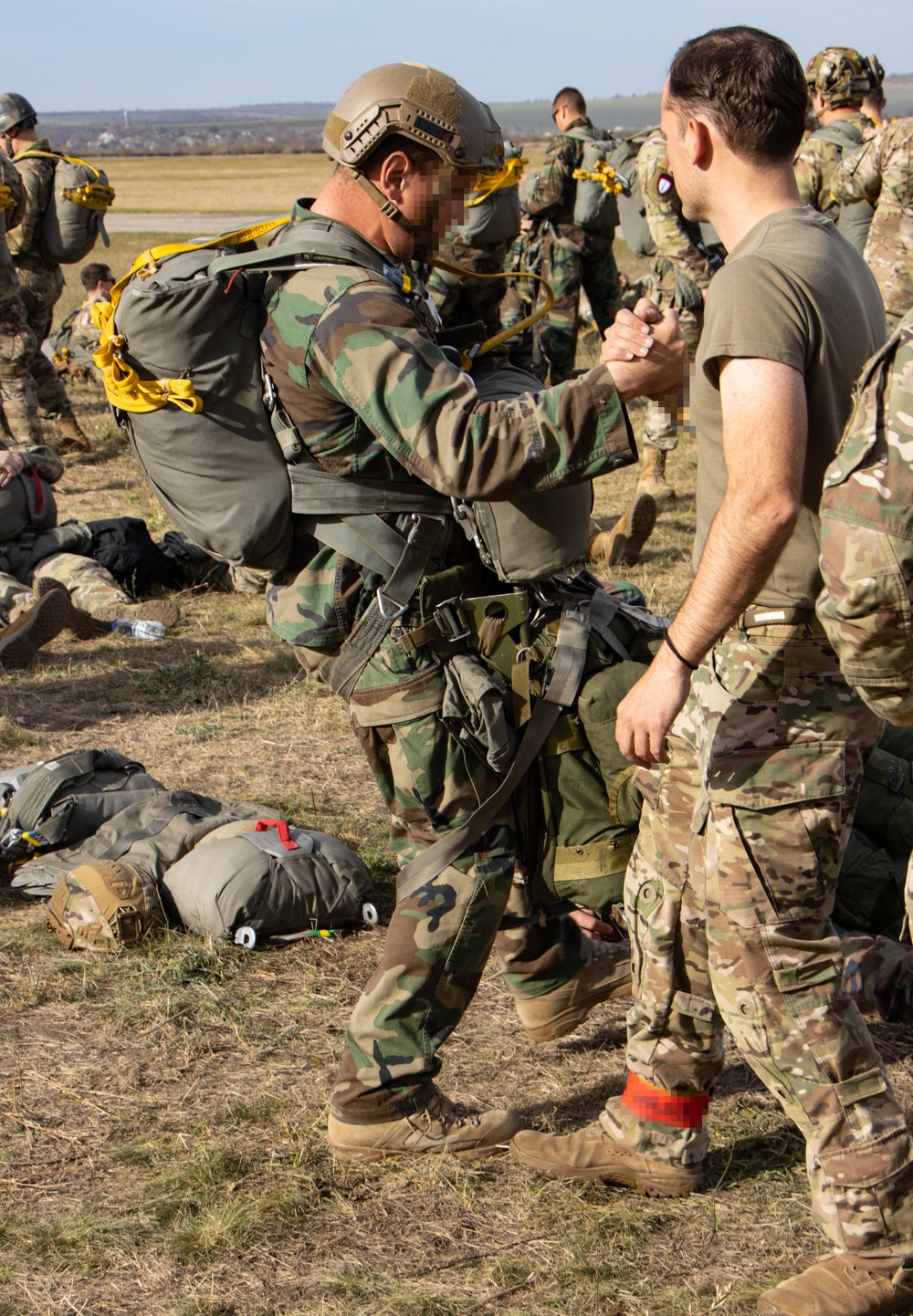 Paratroopers with Special Operations Command Europe jump with partners from Moldova