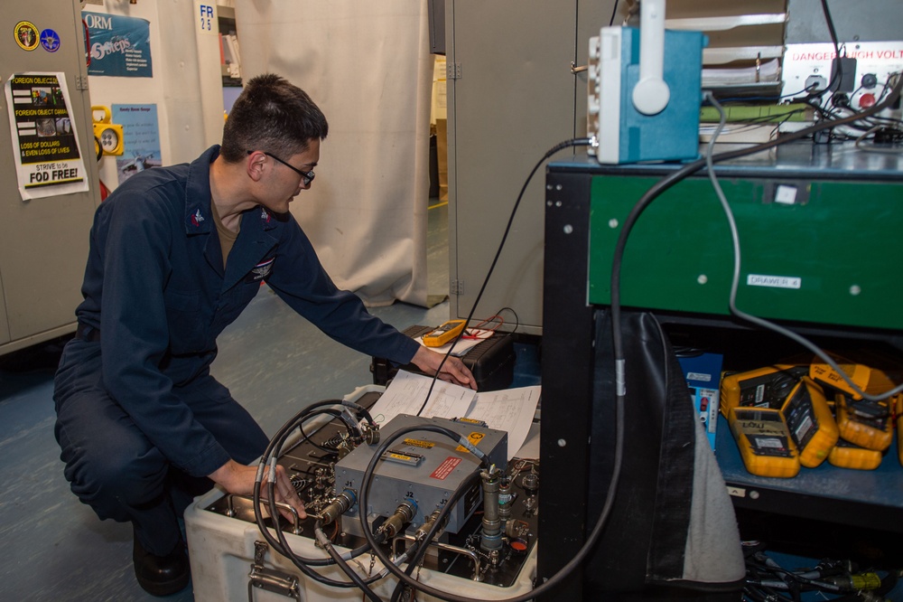 USS Ronald Reagan (CVN 76) Sailors perform daily maintenance