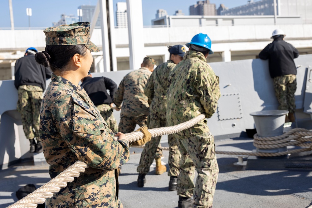 USS New York leaves New York City