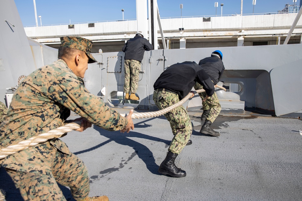 USS New York leaves New York City