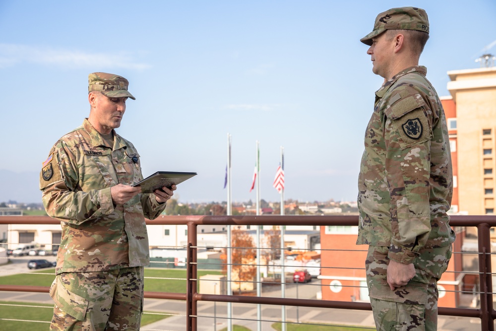 Staff Sgt. Brandon Rickert re-enlists