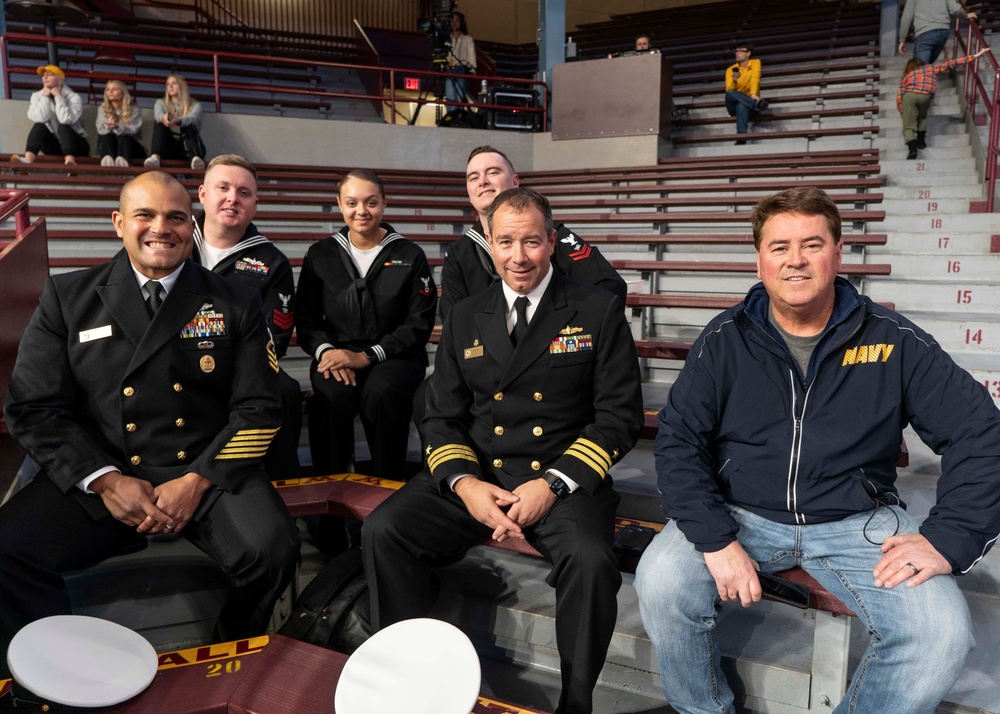 USS Minneapolis-Saint Paul (LCS 21) Sailors are recognozed during a University of Minnesota basketball game.