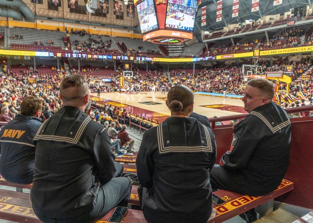 USS Minneapolis-Saint Paul (LCS 21) Sailors are recognozed during a University of Minnesota basketball game.