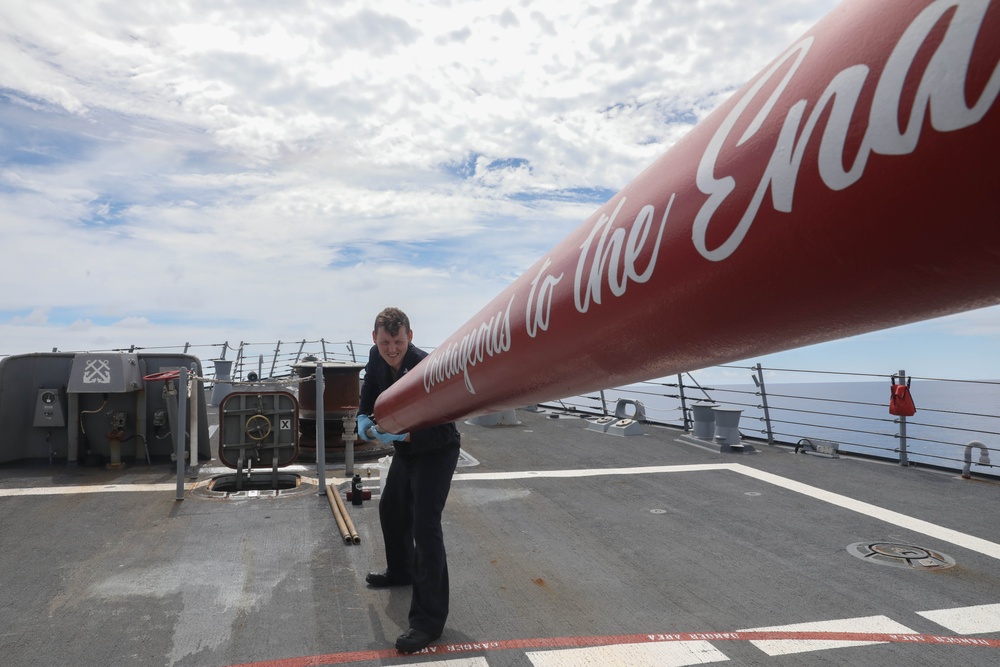 Sailors aboard the USS Rafael Peralta (DDG 115) conduct a live fire exercise with the HMCS Ottawa (FFH 341) and the HMAS Brisbane (DDG 41) as part of operation Noble Wolverine in the South China Sea