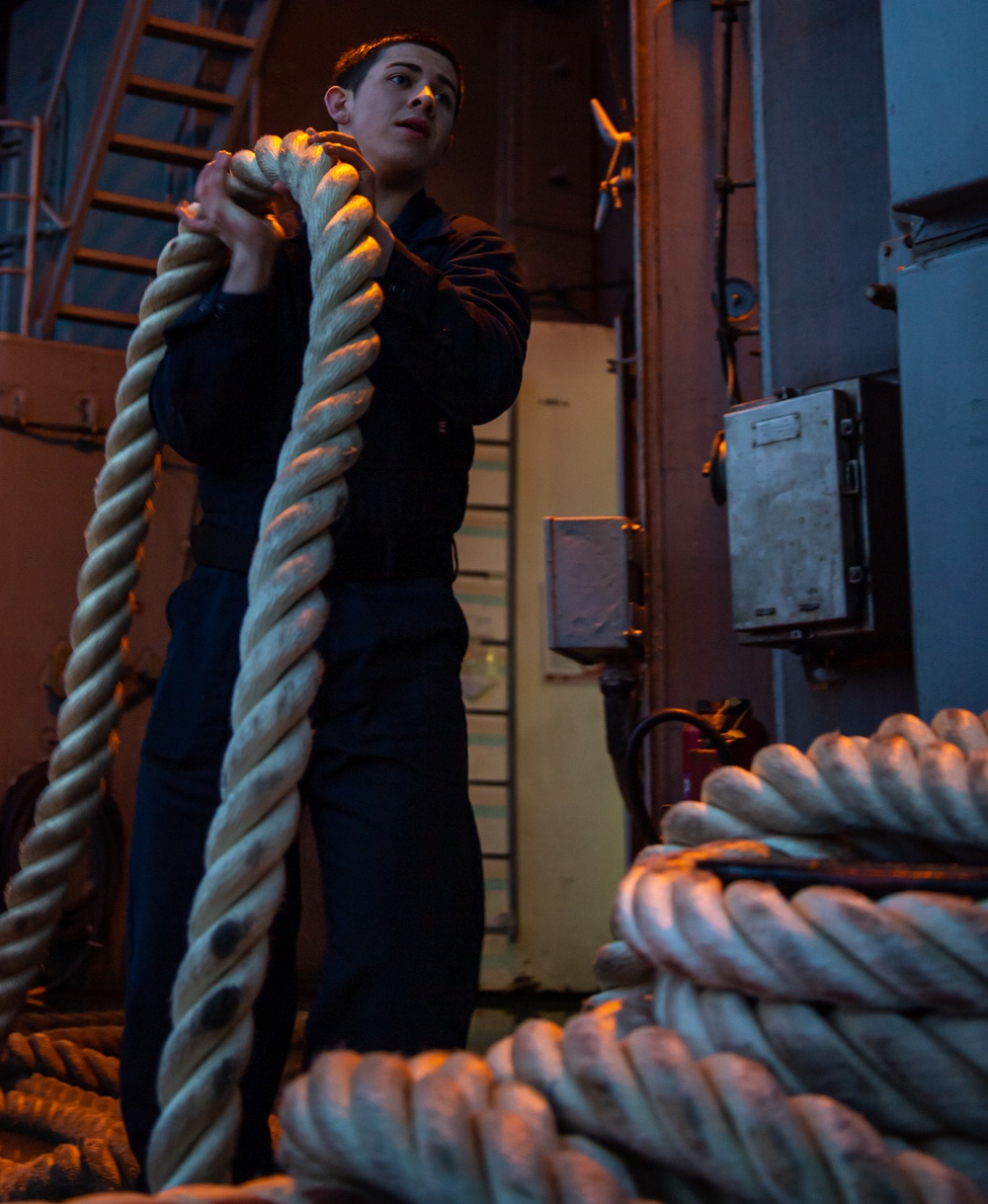 U.S. Navy Sailor Handles Line