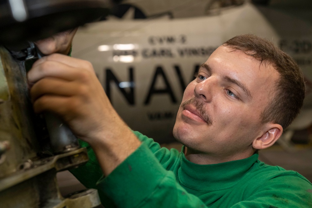 Sailors Assigned to Helicopter Maritime Strike Squadron (HSM) 78 Conduct Maintenance on an MH-60R Sea Hawk