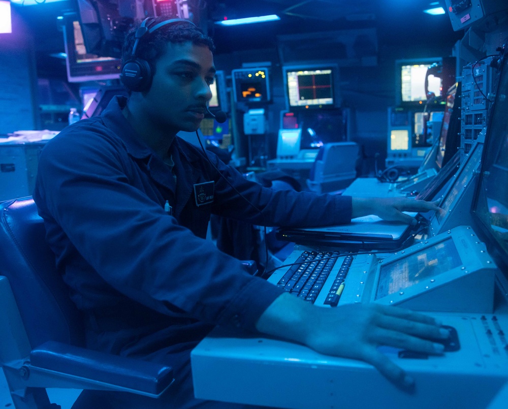 OSSN Gomez Tracks Surface Vessels on Radar Console Aboard USS Antietam (CG 54)