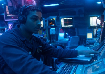 OSSN Gomez Tracks Surface Vessels on Radar Console Aboard USS Antietam (CG 54)