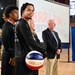 Operation Homefront brings Harlem Globetrotters, and holiday meal kits to D.C. Armory