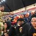 Operation Homefront brings Harlem Globetrotters, and holiday meal kits to D.C. Armory