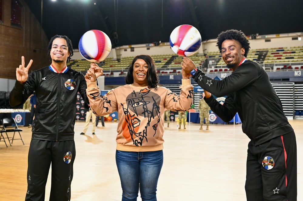 Operation Homefront brings Harlem Globetrotters, and holiday meal kits to D.C. Armory