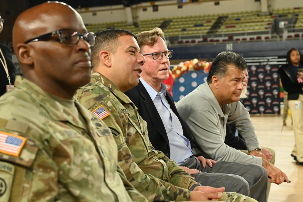 Operation Homefront brings Harlem Globetrotters, and holiday meal kits to D.C. Armory