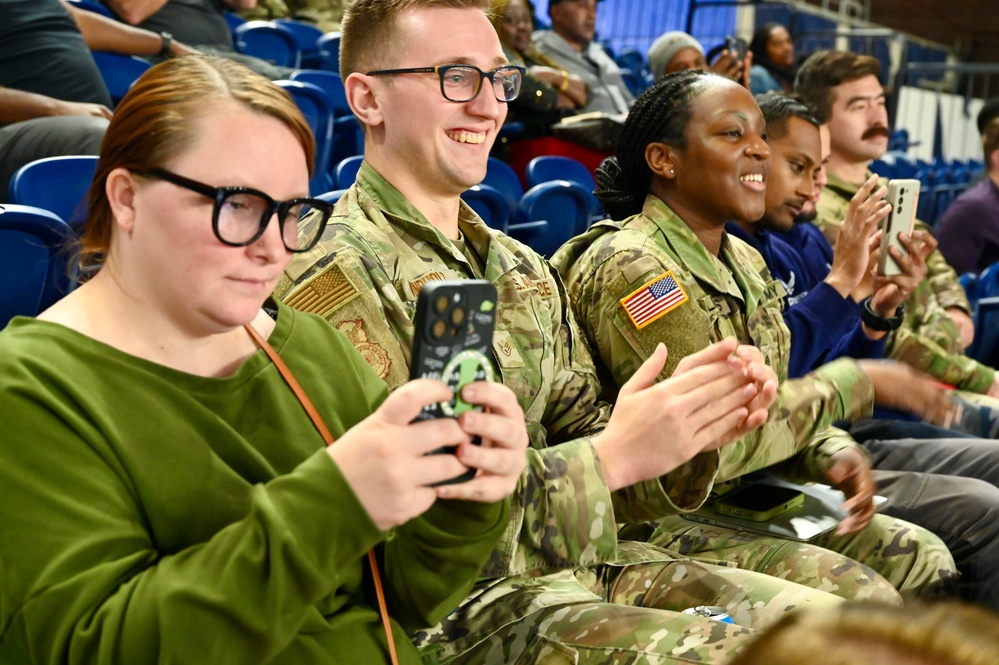 Operation Homefront brings Harlem Globetrotters, and holiday meal kits to D.C. Armory