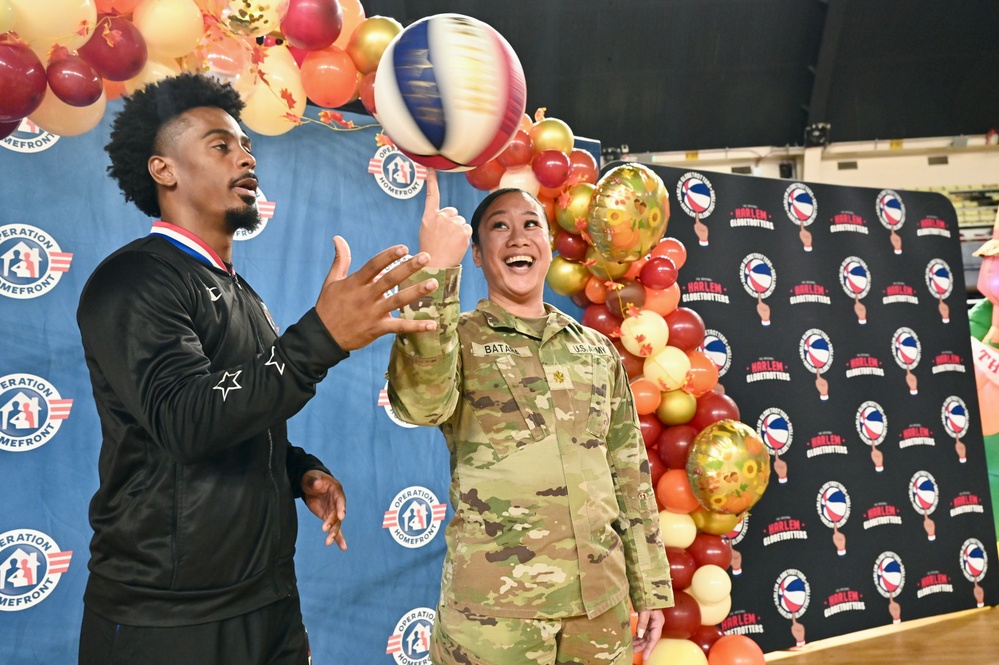 Operation Homefront brings Harlem Globetrotters, and holiday meal kits to D.C. Armory