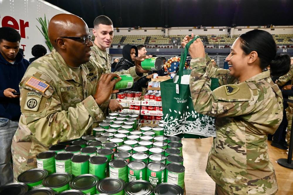 Operation Homefront brings Harlem Globetrotters, and holiday meal kits to D.C. Armory