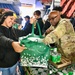 Operation Homefront brings Harlem Globetrotters, and holiday meal kits to D.C. Armory