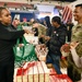 Operation Homefront brings Harlem Globetrotters, and holiday meal kits to D.C. Armory