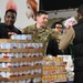 Operation Homefront brings Harlem Globetrotters, and holiday meal kits to D.C. Armory