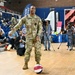 Operation Homefront brings Harlem Globetrotters, and holiday meal kits to D.C. Armory