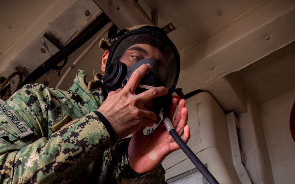 Sailor Conducts Maintenance