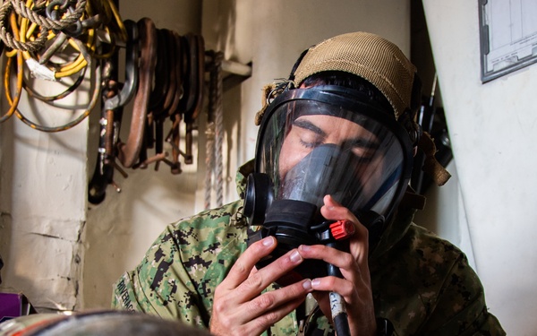 Sailor Conducts Maintenance