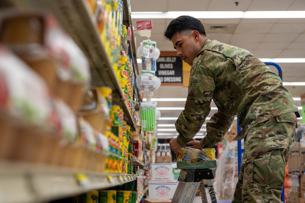 DeCA works with Airmen and Sailors to stock up commissaries