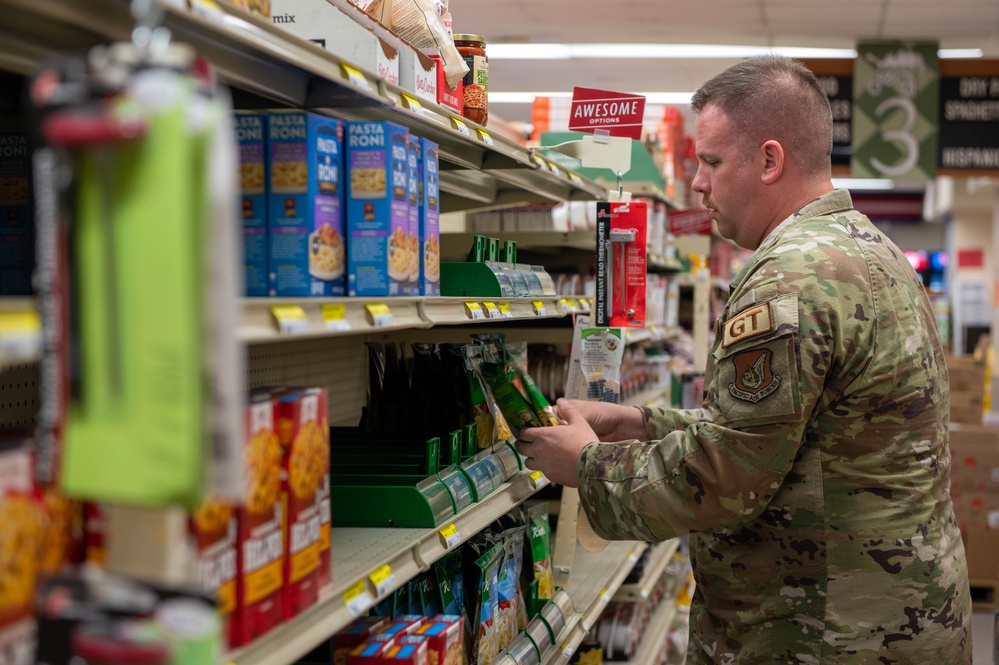 DeCA works with Airmen and Sailors to stock up commissaries